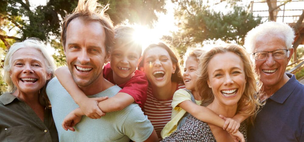 Happy Family portrait after visiting the top orthodontist in Wilmington, NC