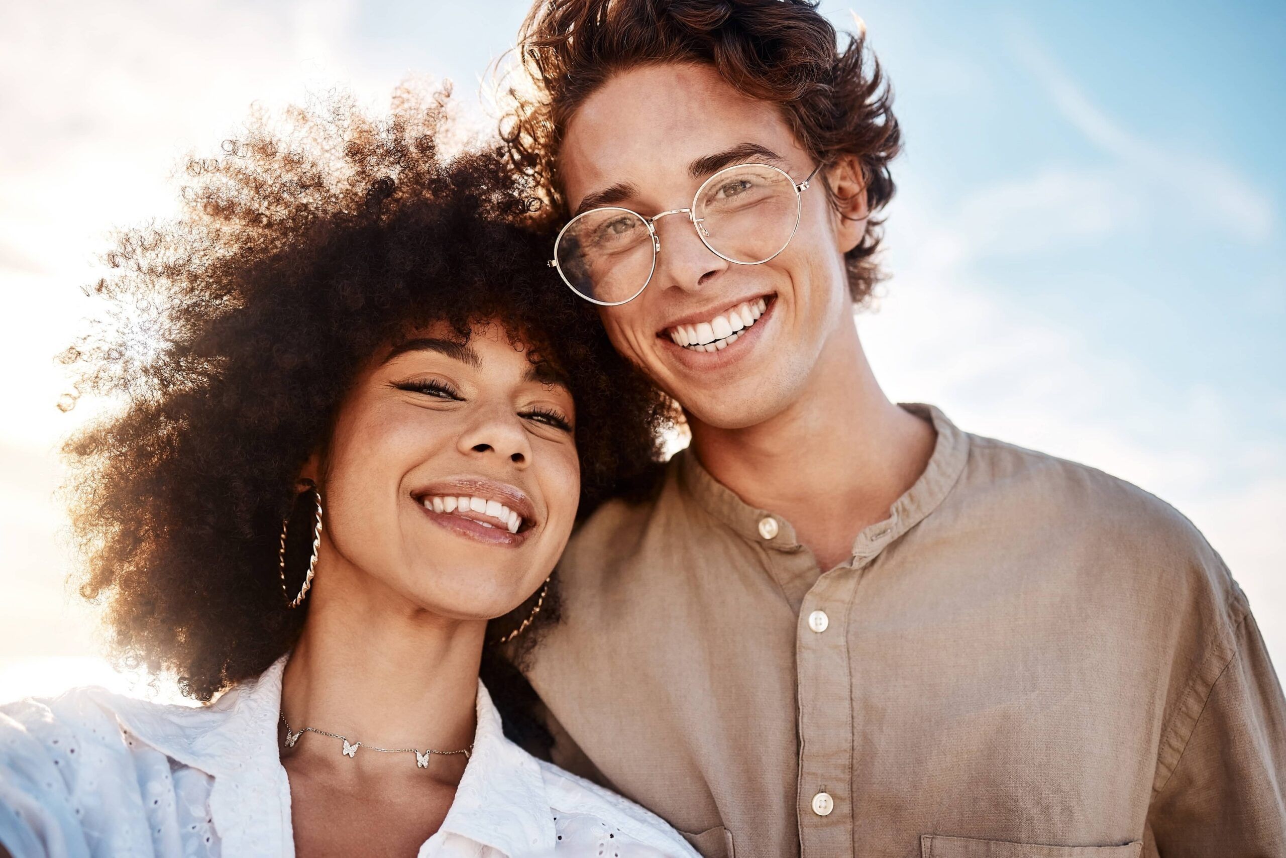 Portrait of a young couple enjoying a day at the beach