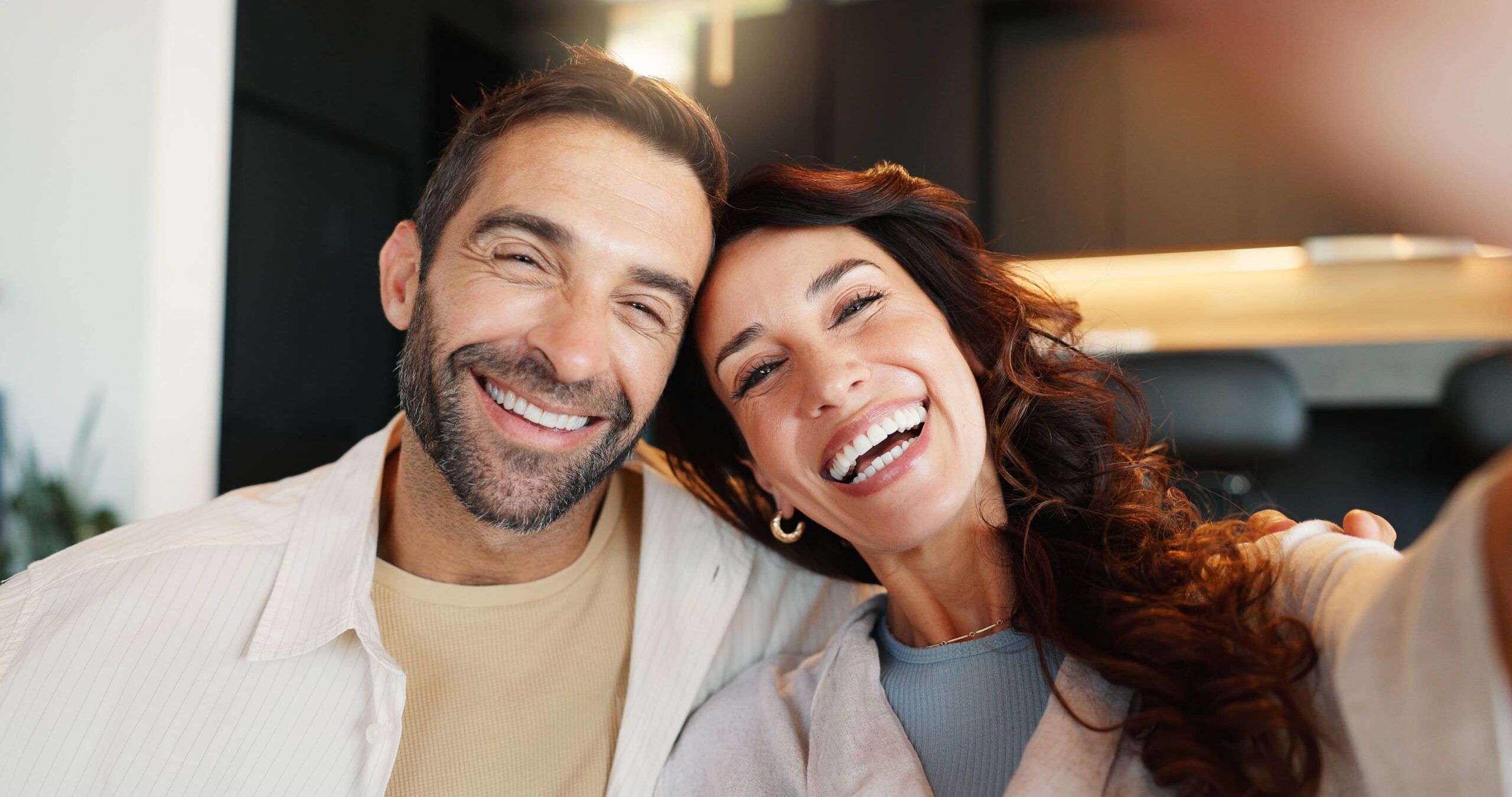 Couple, portrait and happy with selfie in home for social media post