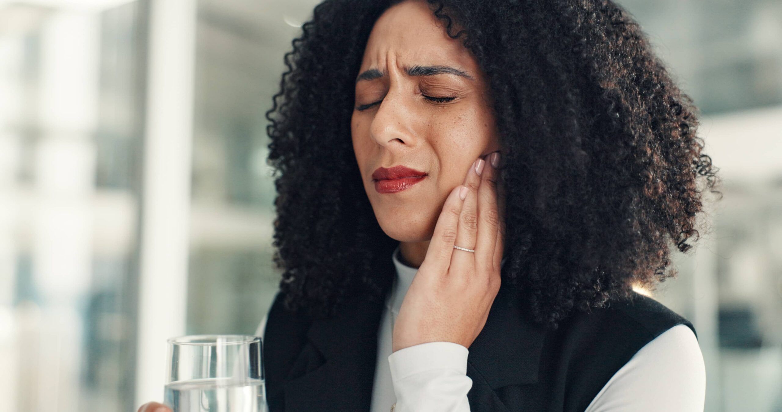 Water, business and woman in office with toothache,