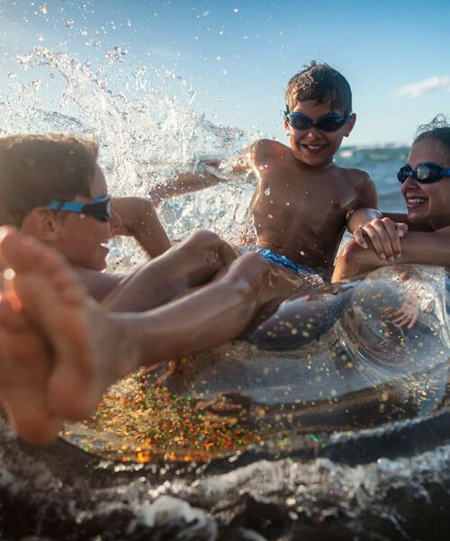 happy family enjoying the beach